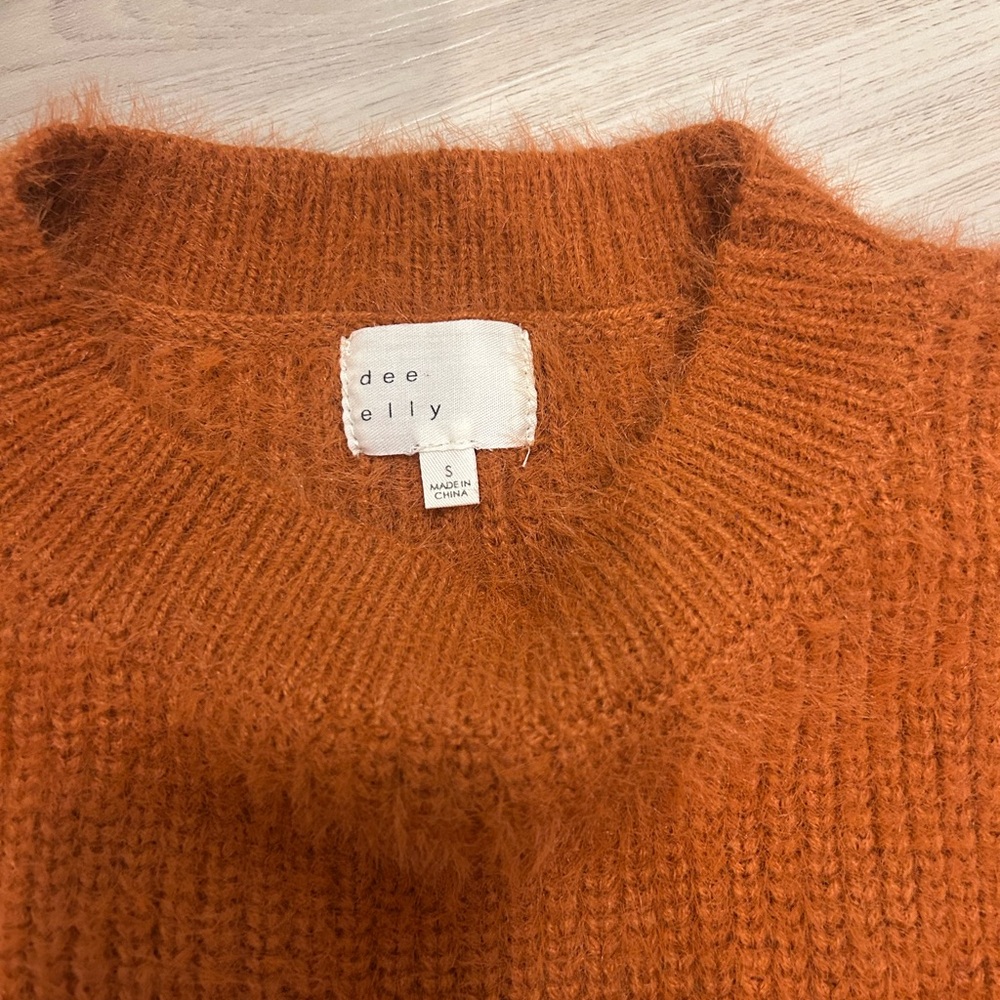 Orange Crew Neck Sweater with Ribbed Knit Details